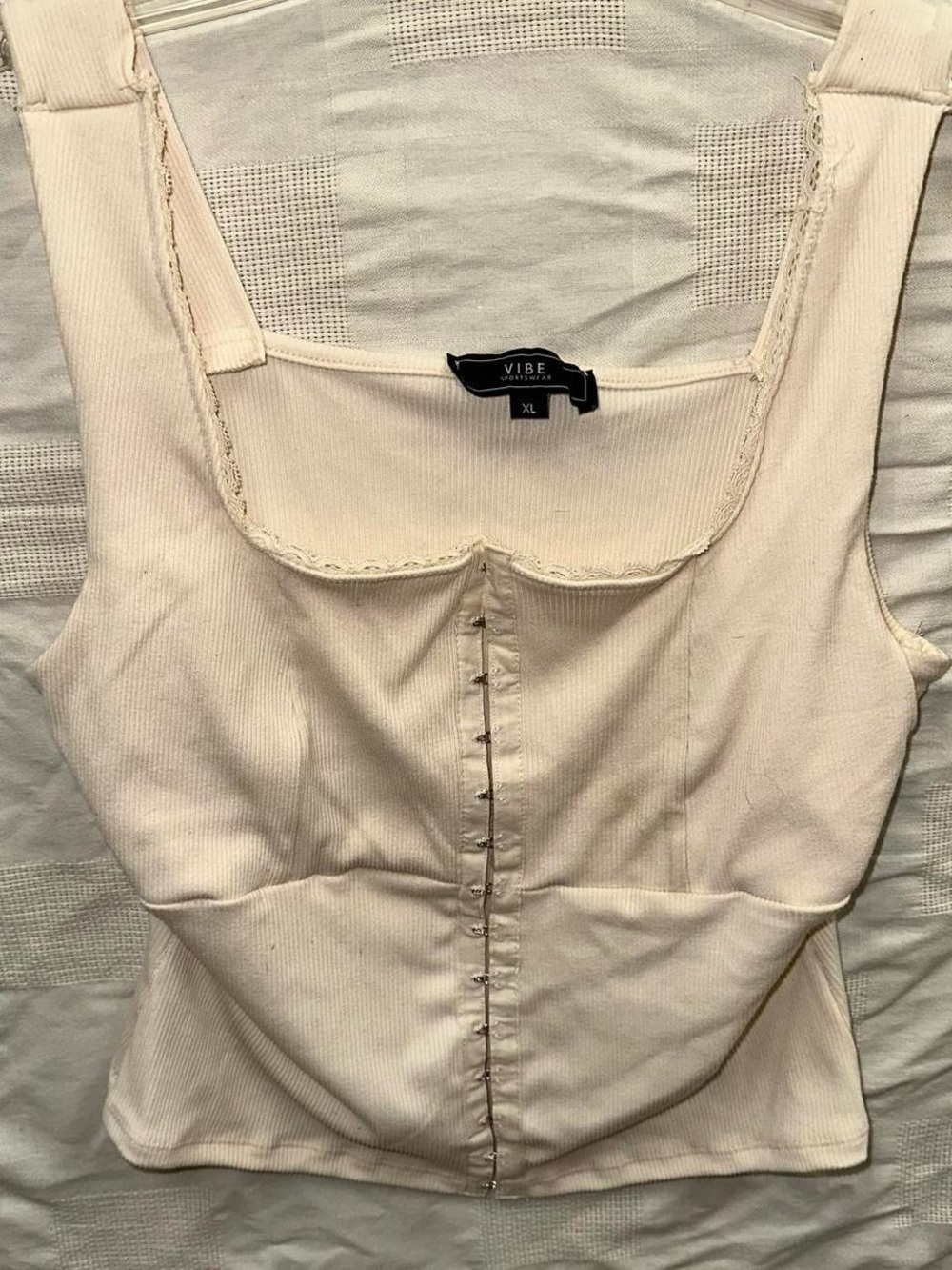 Cream corset style lace tank top.